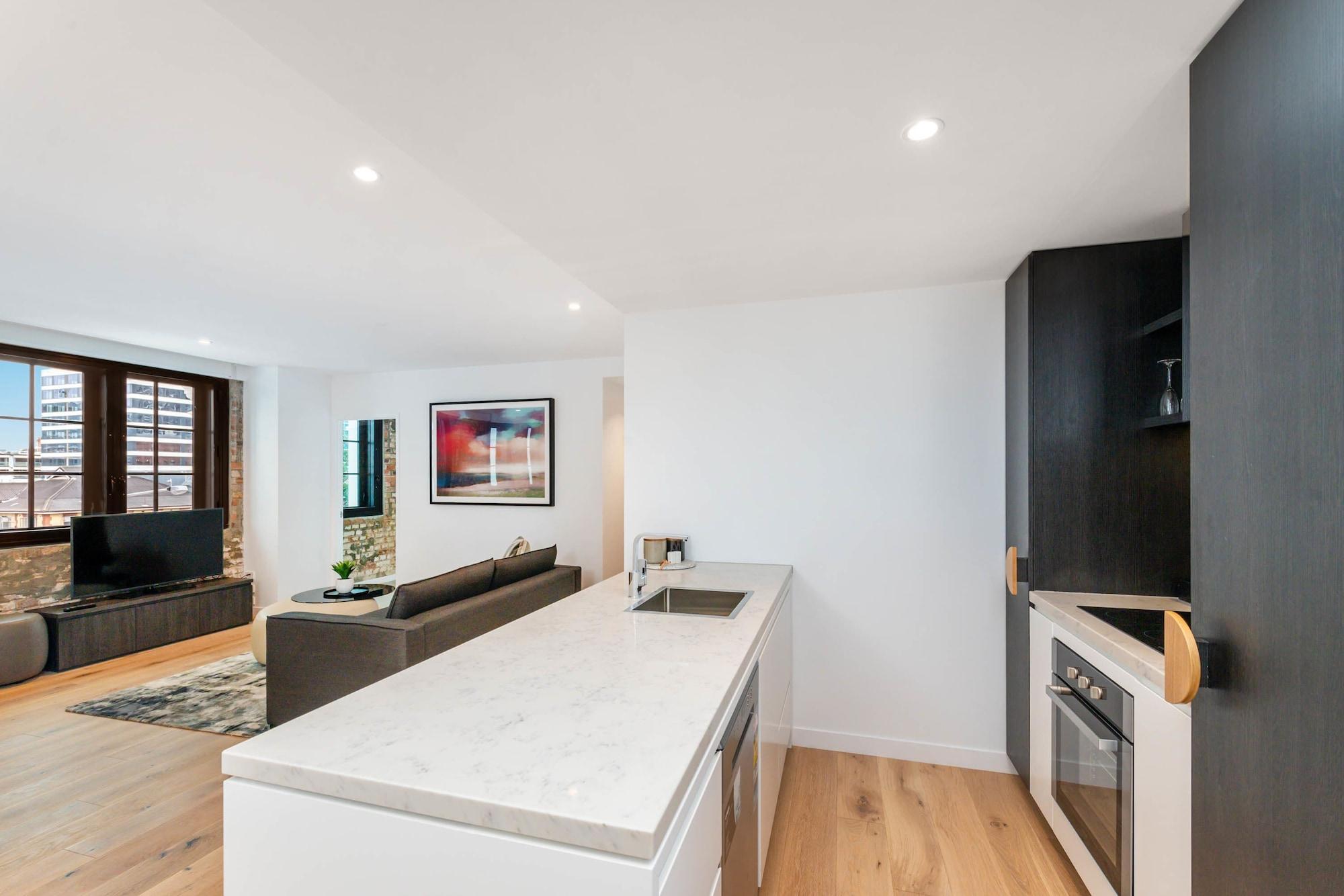 Fv By Peppers Aparthotel Brisbane Exterior foto The kitchen and living area of a typical apartment
